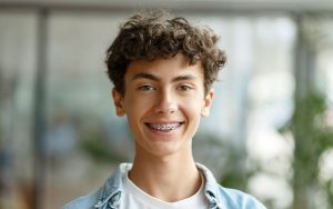 D&D Dental Clinic - patient smiling with their braces
