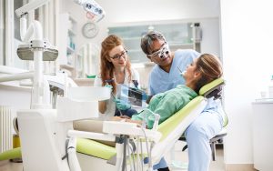 D&D Dental clinic: Patient talking to their dental checkup
